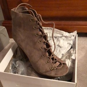 Tan lace up ankle booties